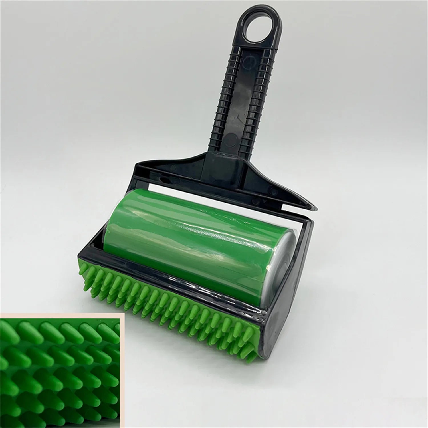 Pet hair remover roller cleaning a sofa