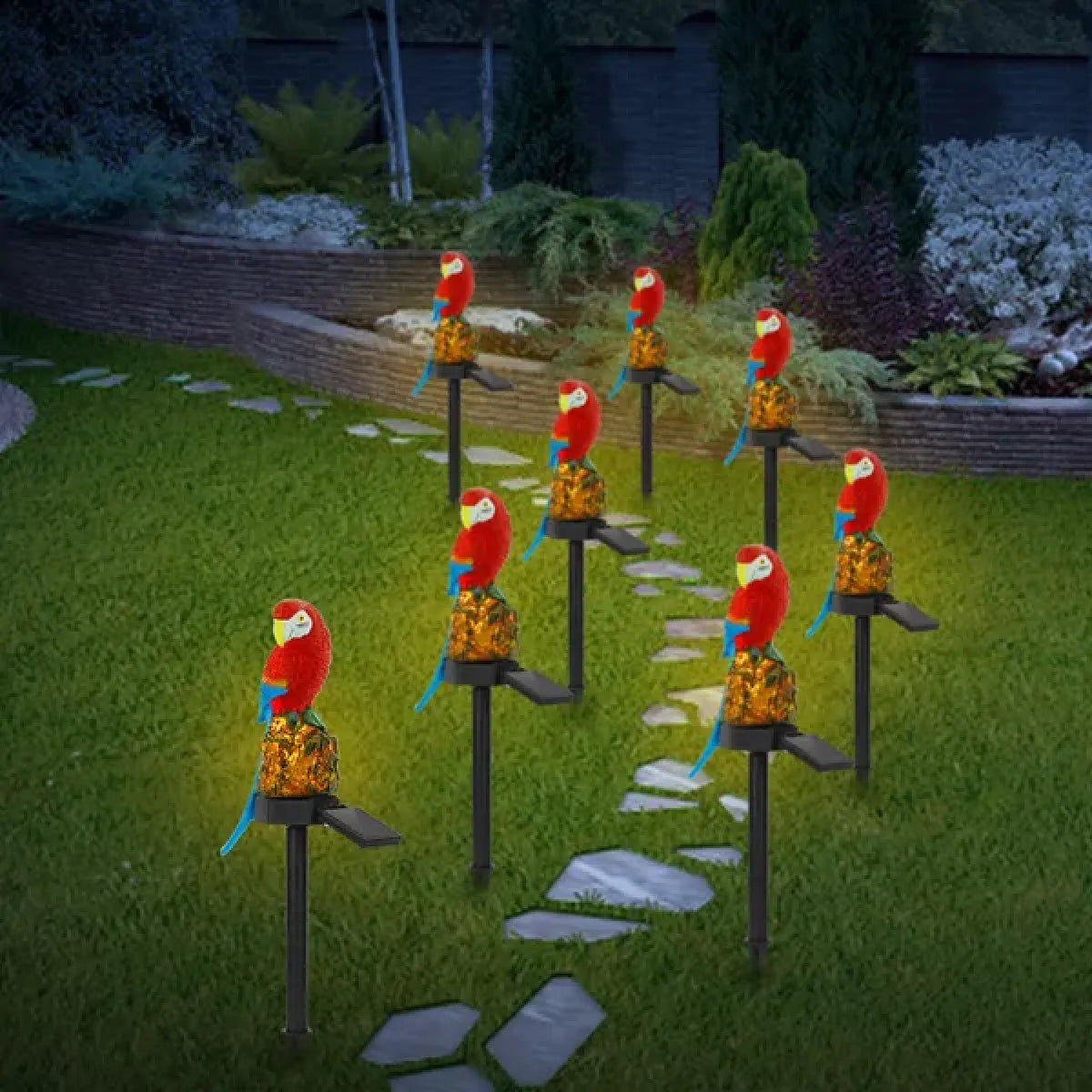 Solar Parrot Garden Lights lining a garden path at night